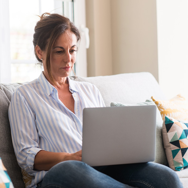 A person watching a UCA webinar.